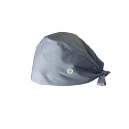 A blue medical work cap with a button, featuring a tie at the back for an adjustable fit.