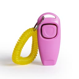 A pink pet training clicker with a yellow coiled strap attached. It has a circular button on the front.