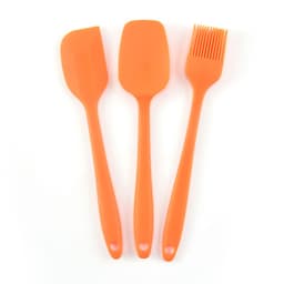 A Silicone Baking Set featuring three orange utensils: a spatula, a flat scraper, and a basting brush.