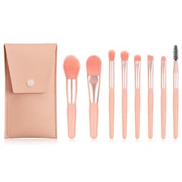 A set of eight makeup brushes in soft pink, housed in a beige pouch with a snap closure.