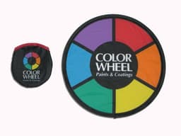 A foldable flyer in vibrant colours, featuring a circular design with multiple colourful segments and a logo.
