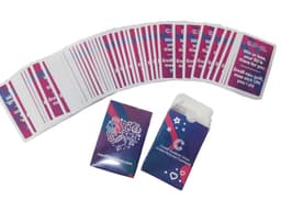 A set of playing cards with a colourful design, accompanied by a matching paper box. Both feature a logo.