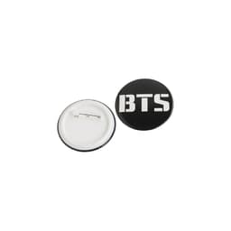 A black 37mm button badge featuring a design and a metal pin back. The badge has a glossy finish.