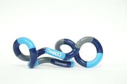 A Tangle product in custom colours of blue, navy, and grey, featuring a logo, displayed against a light background.