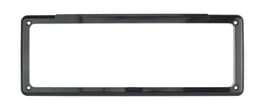 A black license plate frame with rounded edges and mounting holes on each corner. It has no visible logos or text.