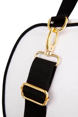 A close-up of a Mini Contrast Bag featuring a gold metal clasp and a black strap against a white fabric background.