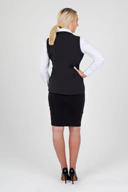 A black women's soft shell vest from the TEMPEST range, viewed from the back, worn over a white shirt.