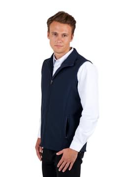 A navy men's soft shell vest from the TEMPEST range, featuring a zip and side pockets, worn over a white shirt.