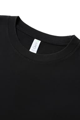 A black oversize T-shirt made from 230gsm 100% organic cotton, featuring a standard crew neck design and a tag.