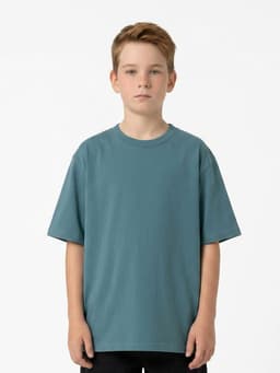 A boy wearing a faded teal T-shirt made from 100% organic cotton. The shirt features a simple design and loose fit.