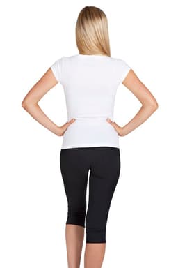 A white women's V-neck T-shirt viewed from the back, paired with black capri leggings.