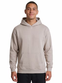 A light beige hoodie with a kangaroo pocket and hood, displayed on a smiling model. The product features a logo.
