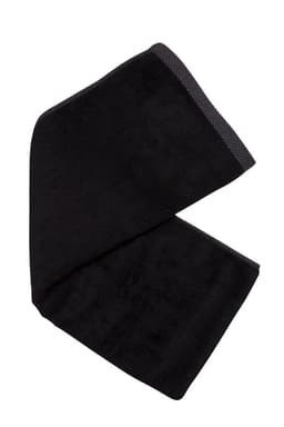 A black bamboo fitness towel with a textured border, featuring a logo on one side.
