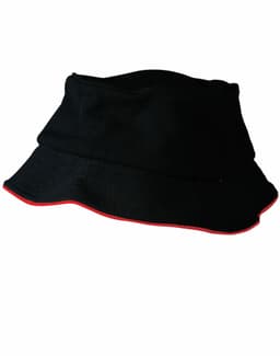 A black bucket hat with a contrasting red trim, featuring a textured mesh design and a logo.