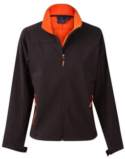 A black softshell jacket with orange contrast features, including a high collar and zippered pockets. It has a logo.