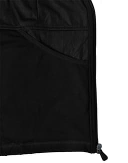 A close-up of the interior of a black softshell jacket, featuring a mesh pocket and zipper detail.