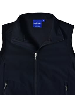 A black, softshell vest featuring a zippered front and a collar. It has a branding label inside.