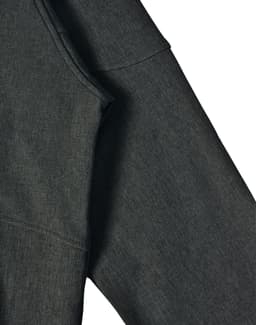 A dark grey ladies' softshell full zip hoodie featuring a textured fabric and a hood. It has a logo.