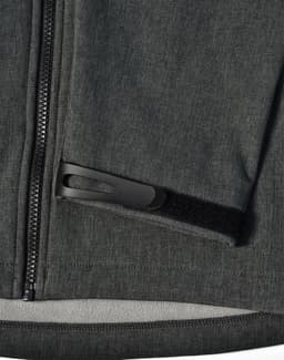 A grey ladies' softshell full zip hoodie featuring a zippered pocket and a logo.