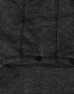 A dark grey fleece jacket featuring a textured fabric and black snap buttons. It has a logo on the garment.