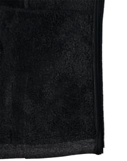 A black ladies' heather bonded fleece jacket featuring a zip closure and soft, textured fabric.