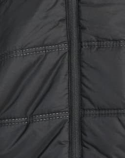 A close-up of a black, unisex sustainable parka jacket featuring a seamless design and zip closure.