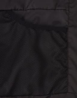 A black parka jacket featuring a textured inner pocket and smooth exterior materials. Includes a logo.