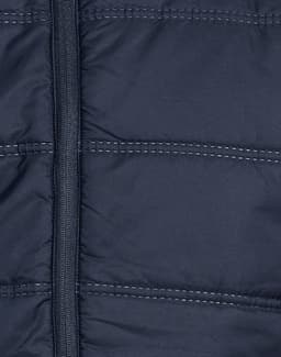 A navy blue unisex sustainable seamless parka jacket featuring a zip fastening and quilted texture.