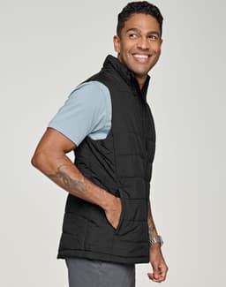A black insulated puffer vest with a 3D cut, featuring side pockets and a collared neckline.