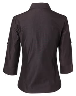 A women's 3/4 sleeve button-up shirt in dark colour, featuring a back view with rollable sleeves. Includes a logo.