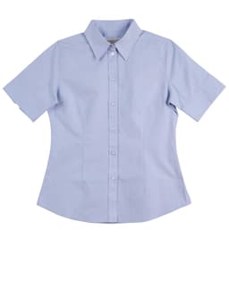 A light blue women's button-up short-sleeve shirt featuring a collar and a logo.