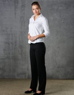 A white women's mini herringbone button-up shirt with 3/4 sleeves, paired with black trousers.