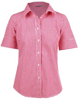 A short-sleeve button-up shirt in red and white gingham check pattern, featuring a collar and a branded label.