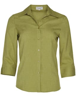 A women's green 3/4 sleeve shirt with a button-up front and a collar, featuring a logo on the label.