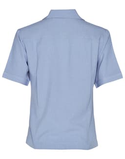 A light blue short sleeve overblouse featuring a collared neckline and a logo. Suitable for uniforms and tunics.