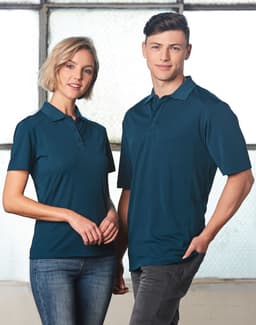 A teal polo shirt for women and a matching darker teal polo shirt for men, both featuring a logo.