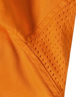 An orange safety shirt featuring mesh panels for breathability, designed for workwear applications.