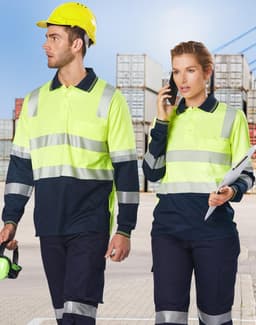 A high-visibility long-sleeve safety polo in luminous yellow and navy blue, featuring reflective stripes and logos.