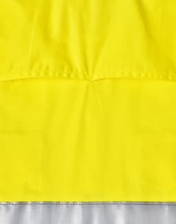 A bright yellow long-sleeved safety shirt with reflective grey material at the bottom and a logo present.