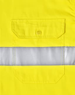 A bright yellow long-sleeve safety shirt featuring a reflective tape and a buttoned pocket. It includes a logo.