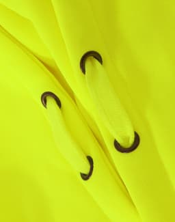 A close-up of a high-visibility yellow fleece hoodie featuring black eyelets for the drawstrings.