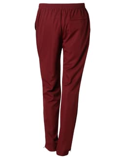 Maroon adult track pants with an elastic waistband and a rear pocket. Features branding on the fabric.
