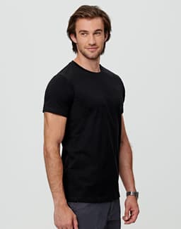 A black men's premium cotton tee displayed on a model, featuring a classic crew neckline and short sleeves.