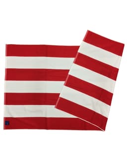 A striped beach towel featuring red and white horizontal stripes, with a small logo in one corner.