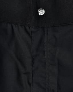 Black work shorts made of rip-stop poly/cotton material, featuring a button closure at the waist.