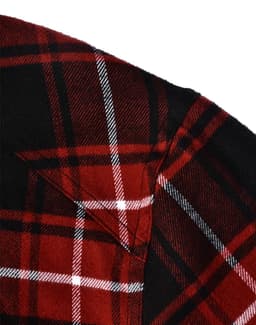 A red and black quilted flannel shirt showcasing a check pattern and a collar. The image features a portion of the shirt.