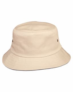 A cream bucket hat with a wide brim and metal eyelets. It features a simple design and has a logo on it.