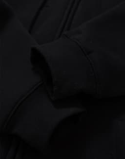 A black men's full-zip fleecy hoodie featuring cuff details and a logo.