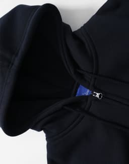 A black men's full-zip fleecy hoodie featuring a hood and zip closure, with a logo on the inside.