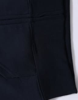 A black kid's full-zip fleecy hoodie featuring a kangaroo pocket and a smooth texture. It has a logo detail.